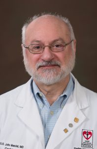 G B John  Mancini